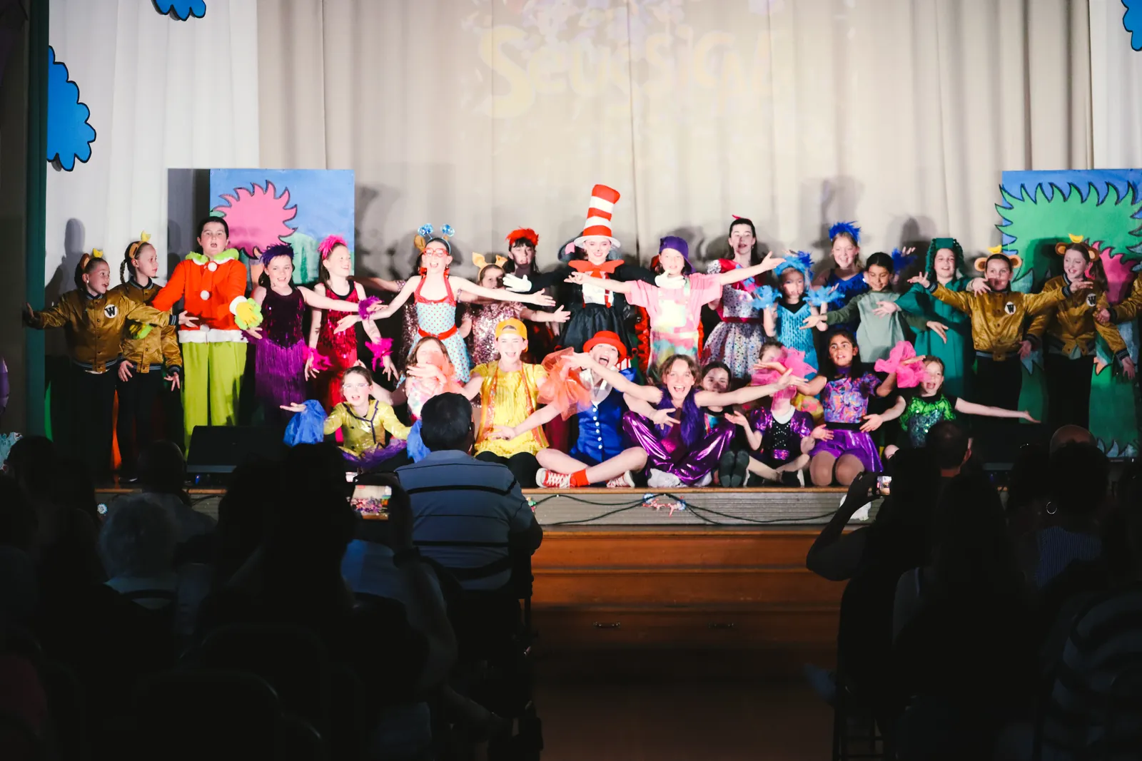 CBY Academy students performing together on stage